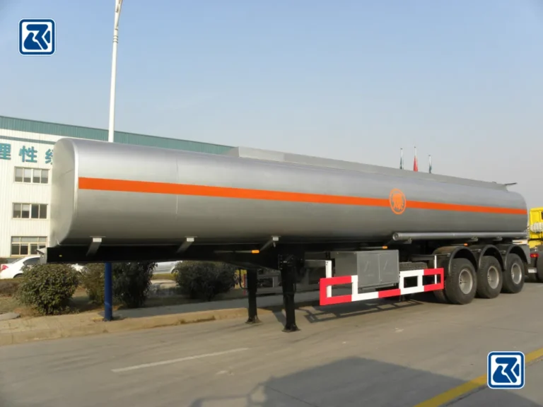 Side view of a HOWO tanker truck showing the tank structure and connection points